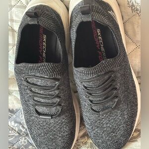 Skechers black slip on shoes